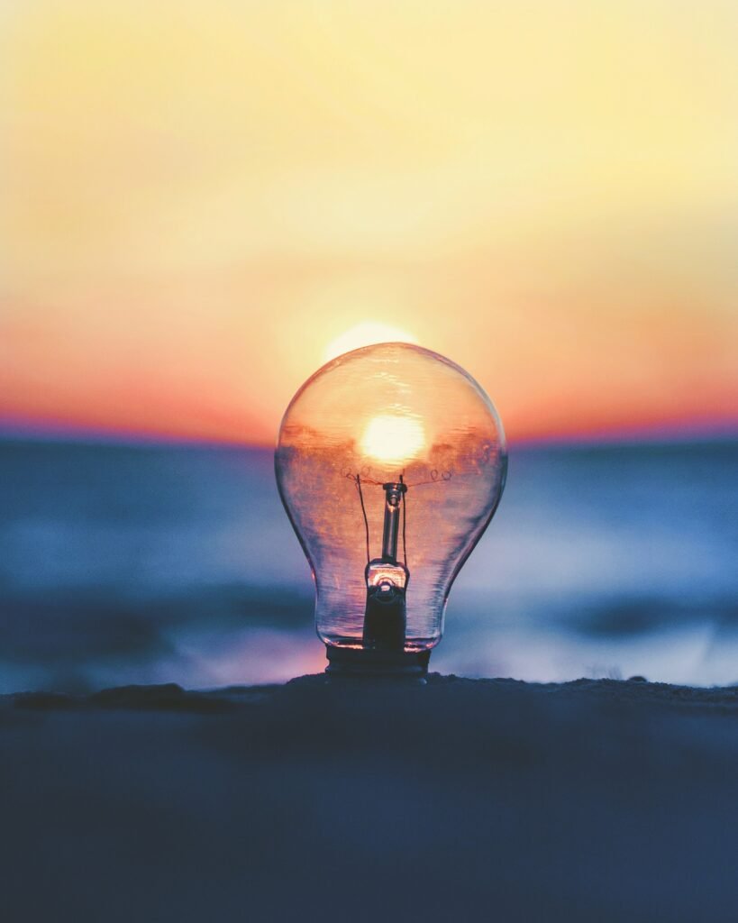 selective focus photography of light bulb